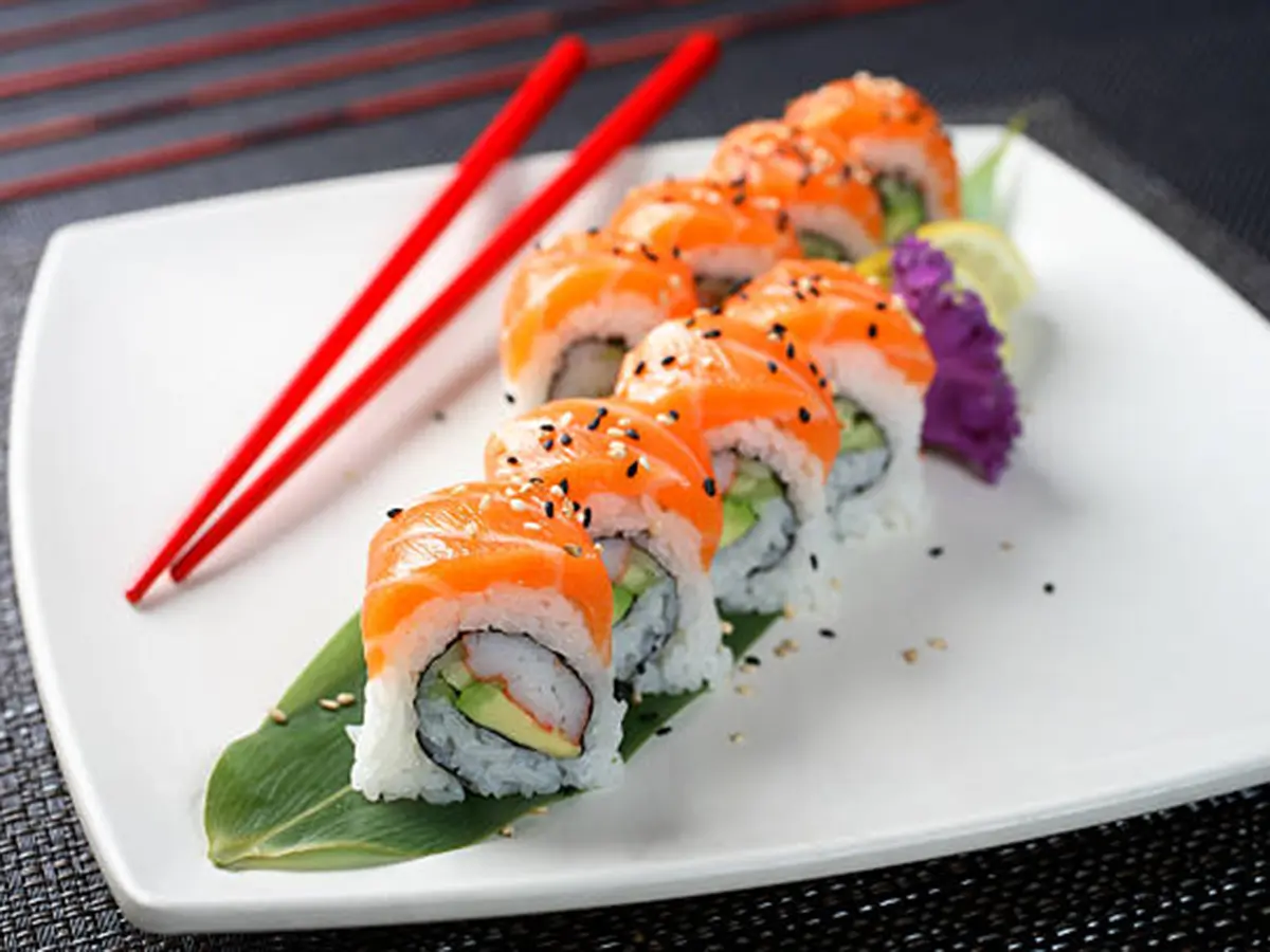 Salmon and avocado sushi roll with fresh ingredients at Osaka Sushi，a Japanese Restaurant in Redding